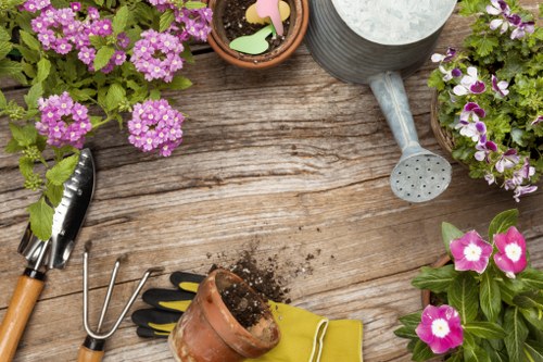 Landscape gardeners designing a Kenton garden with patio and planting